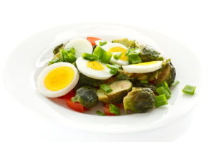 Food sources of choline including Brussels sprouts salad with eggs