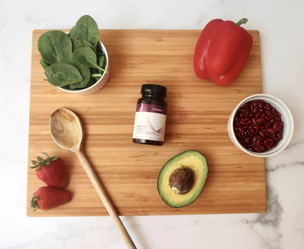 Pendulum Glucose Control Cutting Board with food