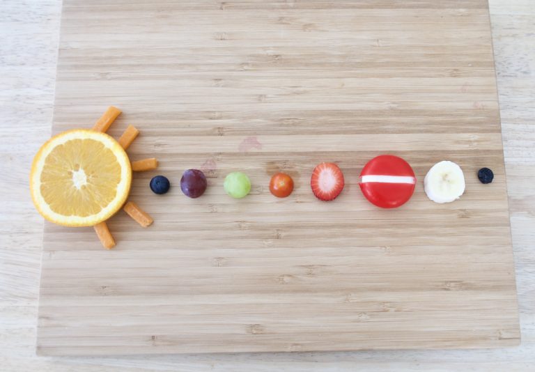 an edible solar system made with healthy snacks after school