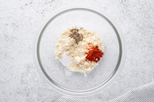 almond flour paprika salt and pepper in a small glass bowl