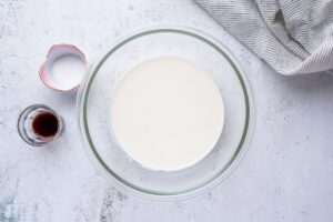 Ingredients for frosting for keto cake in bowl and cups