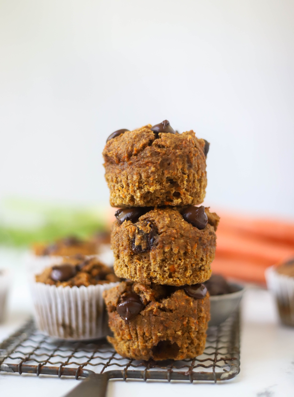 Banana Carrot Muffins stacked on each other