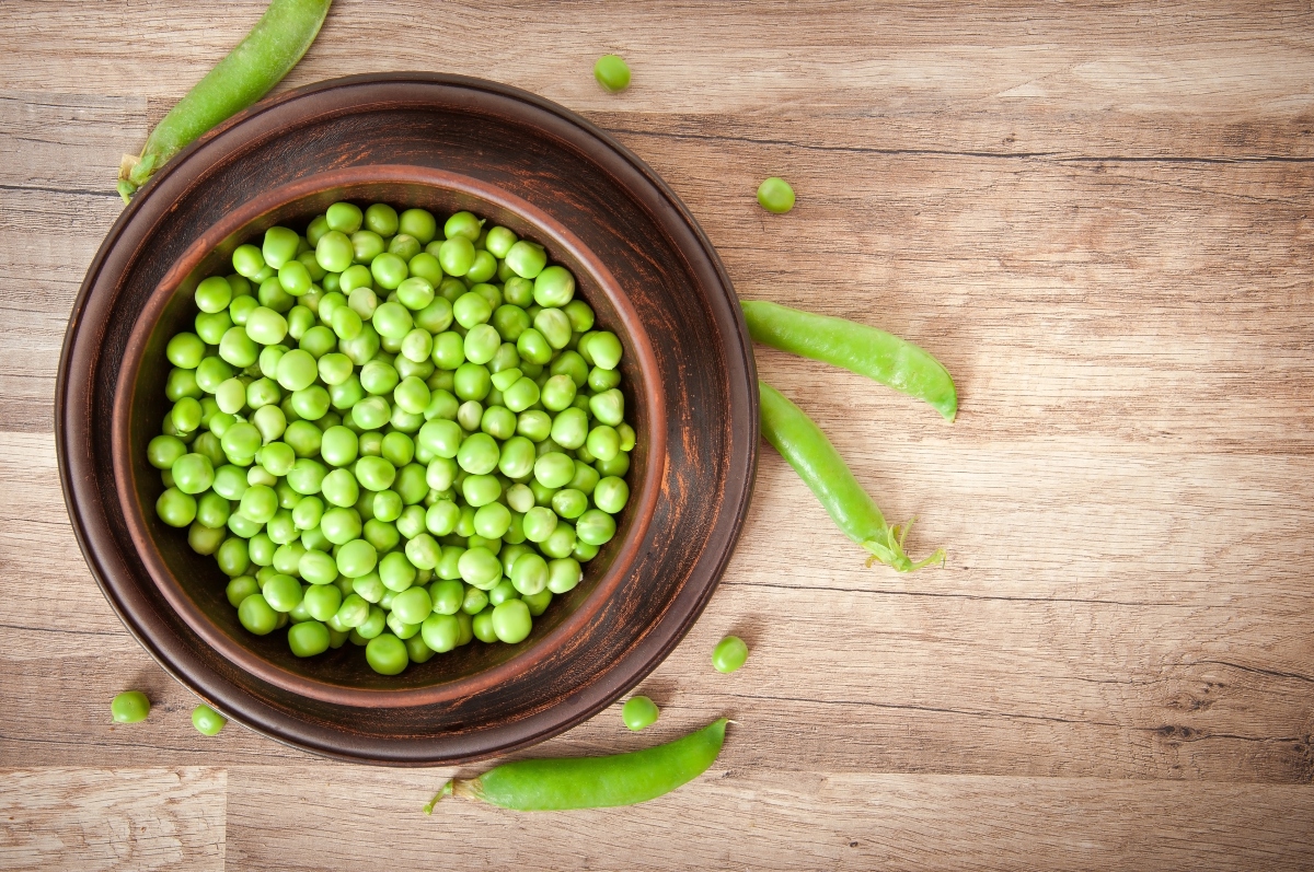 Peas in a wooden bowl