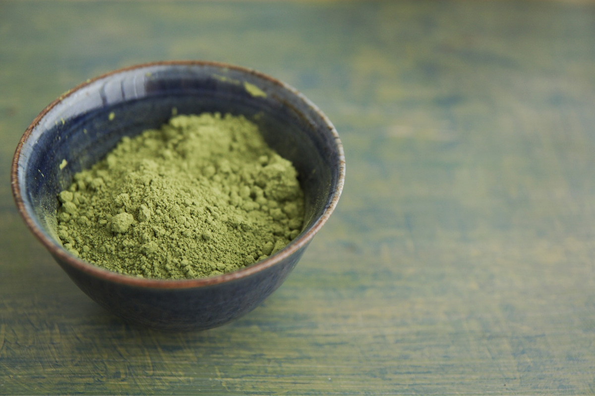 Matcha green tea powder in a cup
