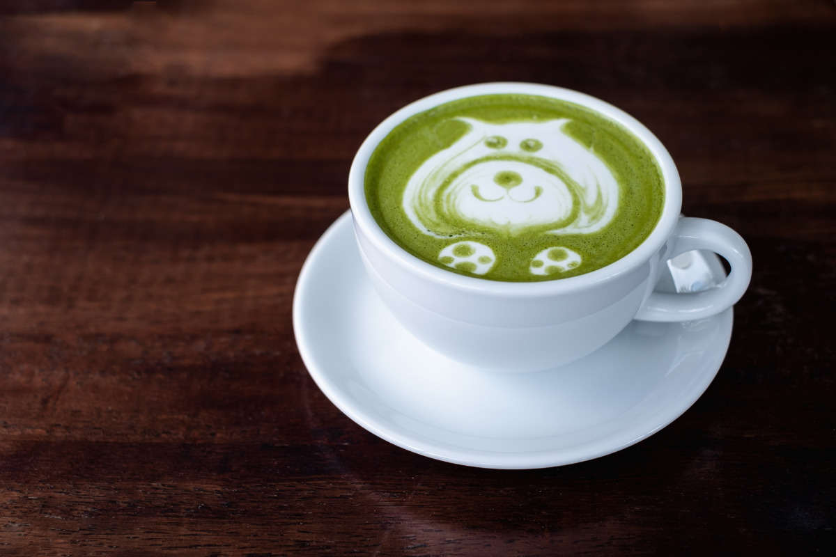 Matha green tea in a cup with teddy-shaped foam