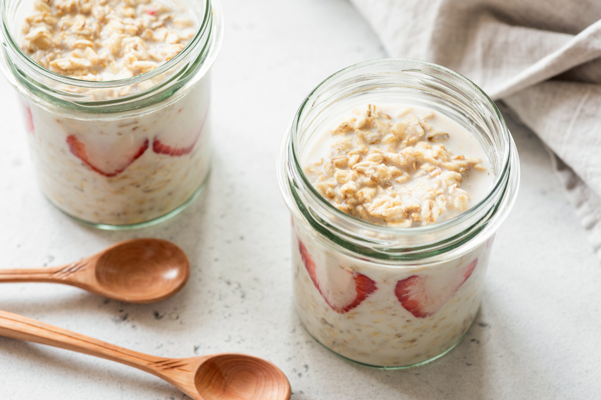 Oatmeal with strawberries in mason jars