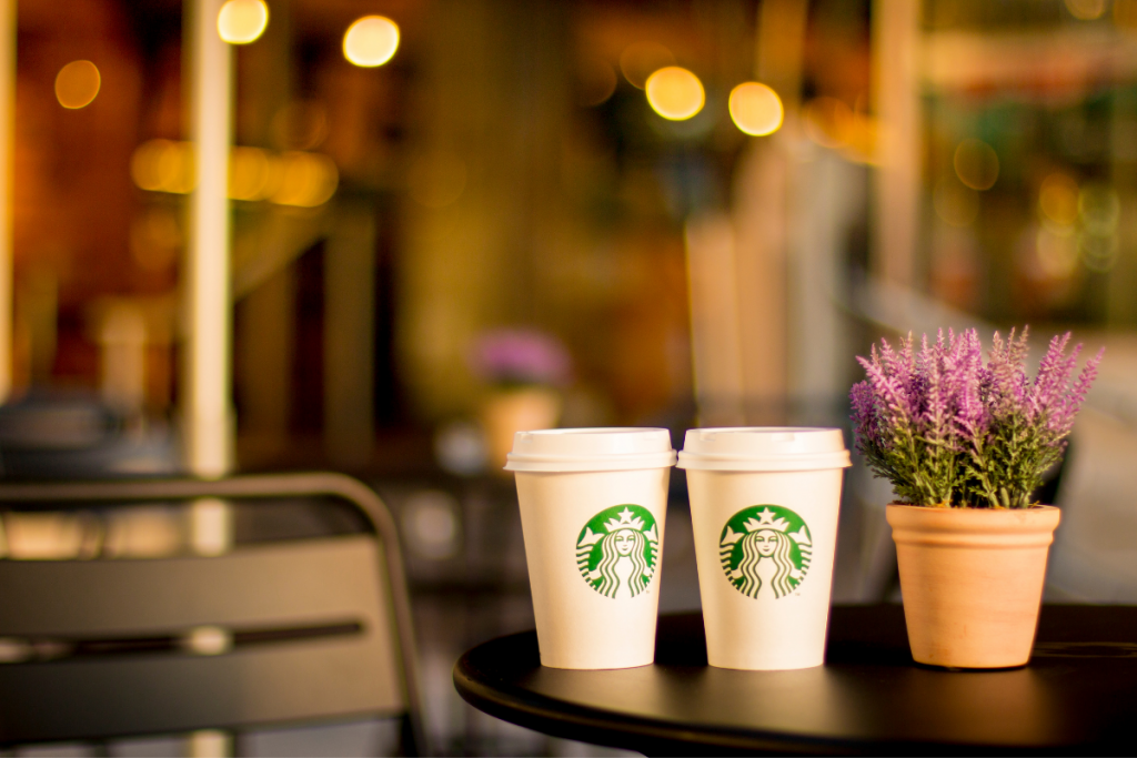 Two low carb Starbucks coffee cups on a table