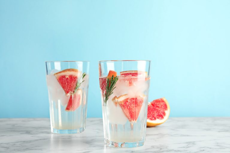 Glasses of infused water with grapefruit slices