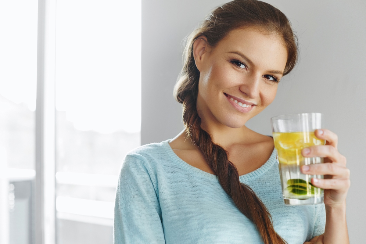 Woman drinking infused water