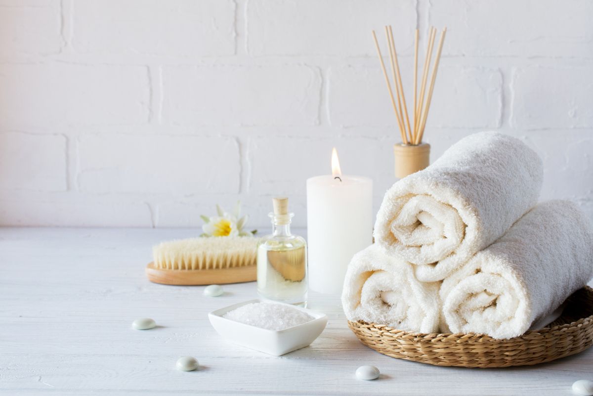 Relaxation gifts for people with diabetes- towels, diffusers, bath salts, and candle
