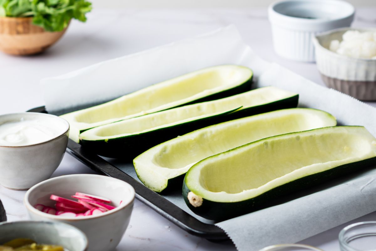 Zucchini boats hollowed out and ready for toppings