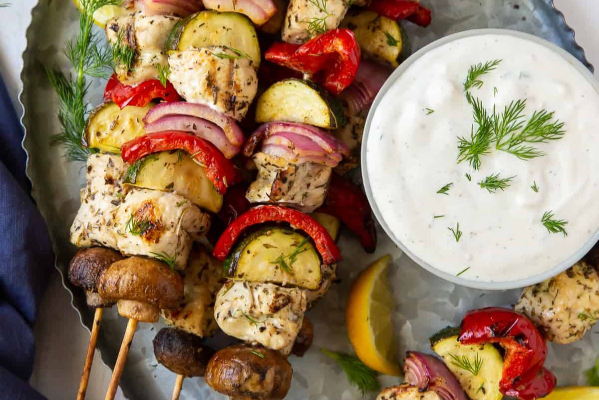 Greek chicken kabobs and sauce 