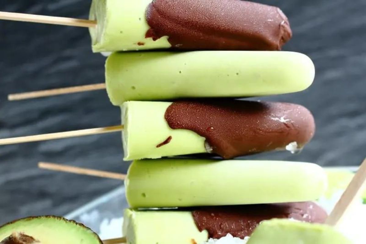 Keto avocado popsicles covered with low sugar chocolate