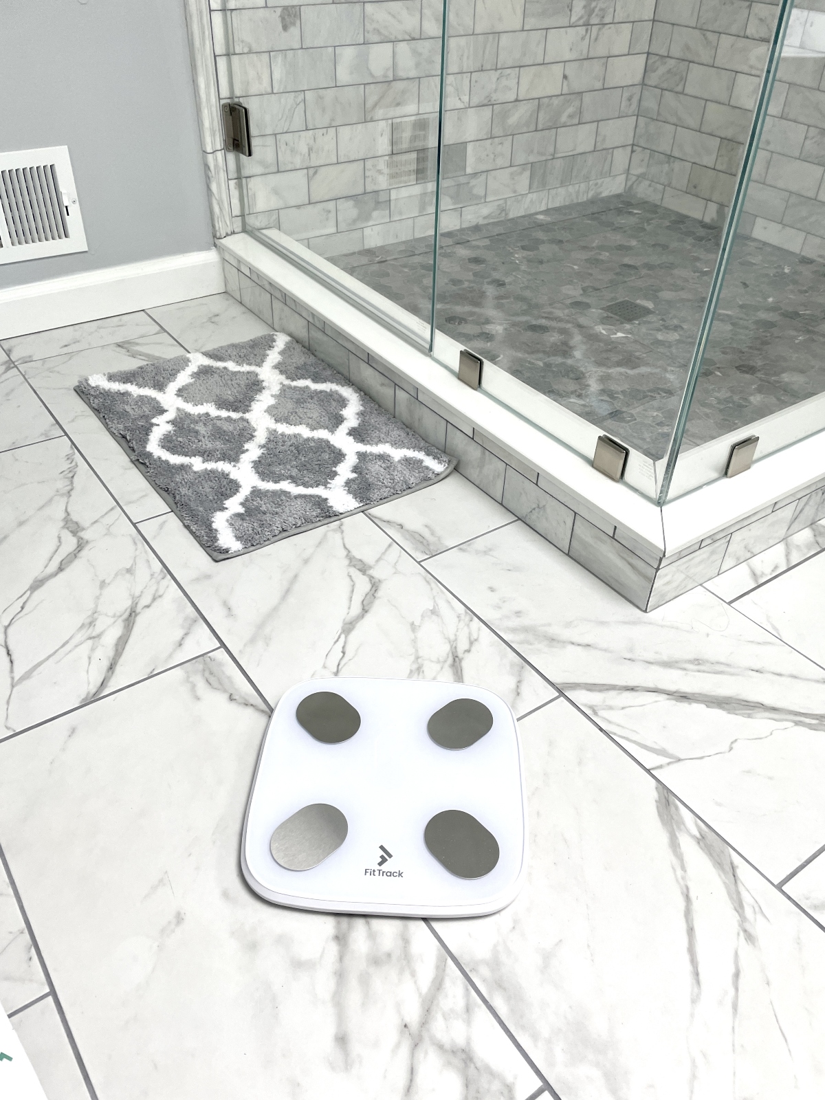 Unpacked smart scale in a bathroom