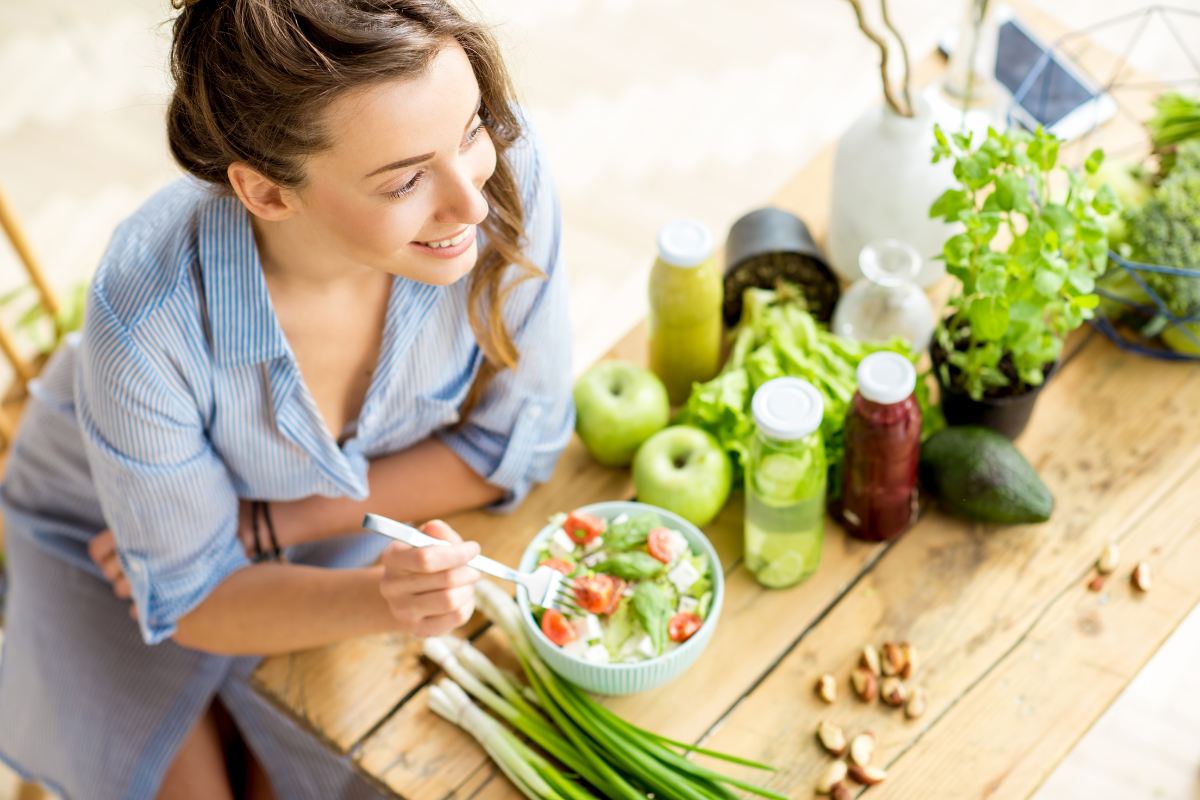 Woman eating healthy salad