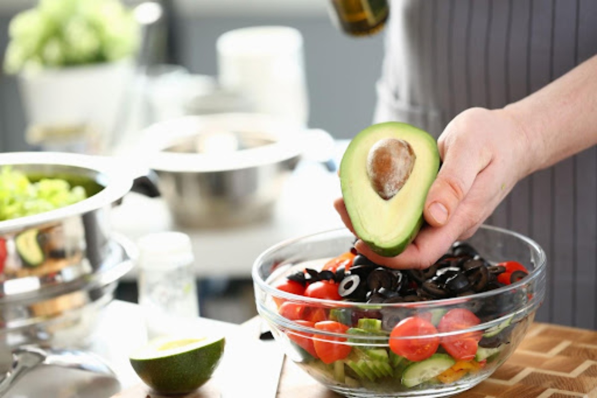 Cutting avocado for salad