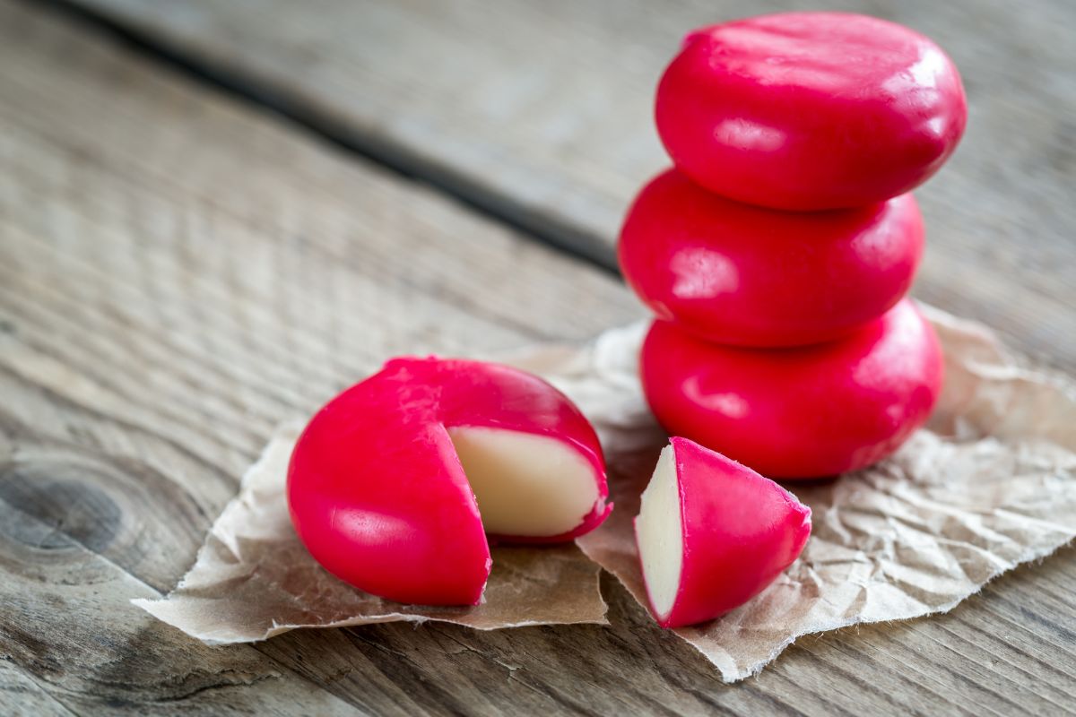 Stack of Mini Cheese on the Wooden Table