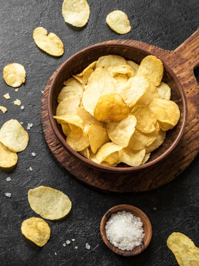 Low carb ships in a tray with small cup of salt beside