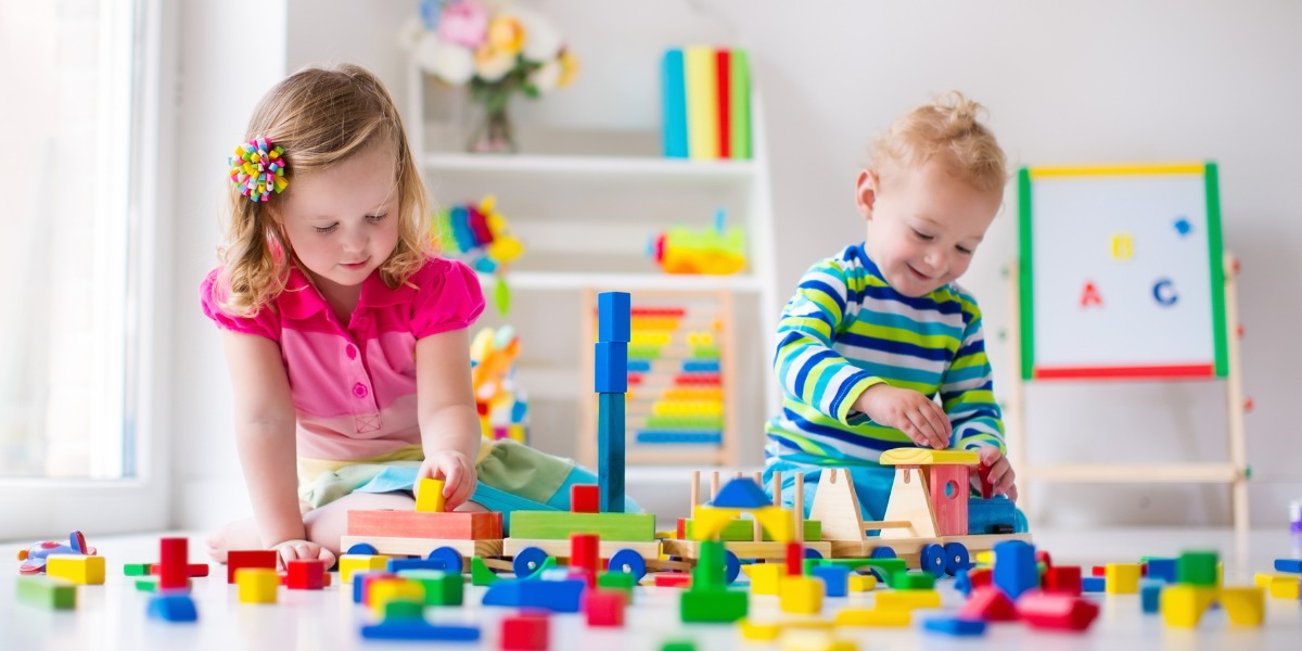 Kids playing with wooden toys