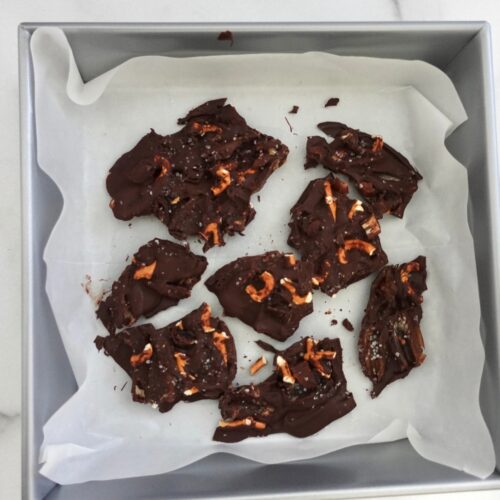 Low Sugar Chocolate bark with dates and sea salt in baking sheet