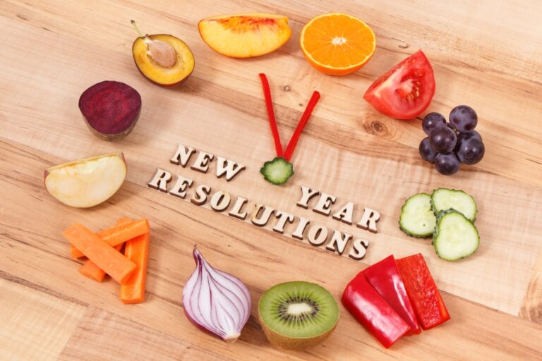 New Year Resolutions clock made of healthy foods