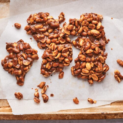 Keto peanut brittle on a cookie sheet