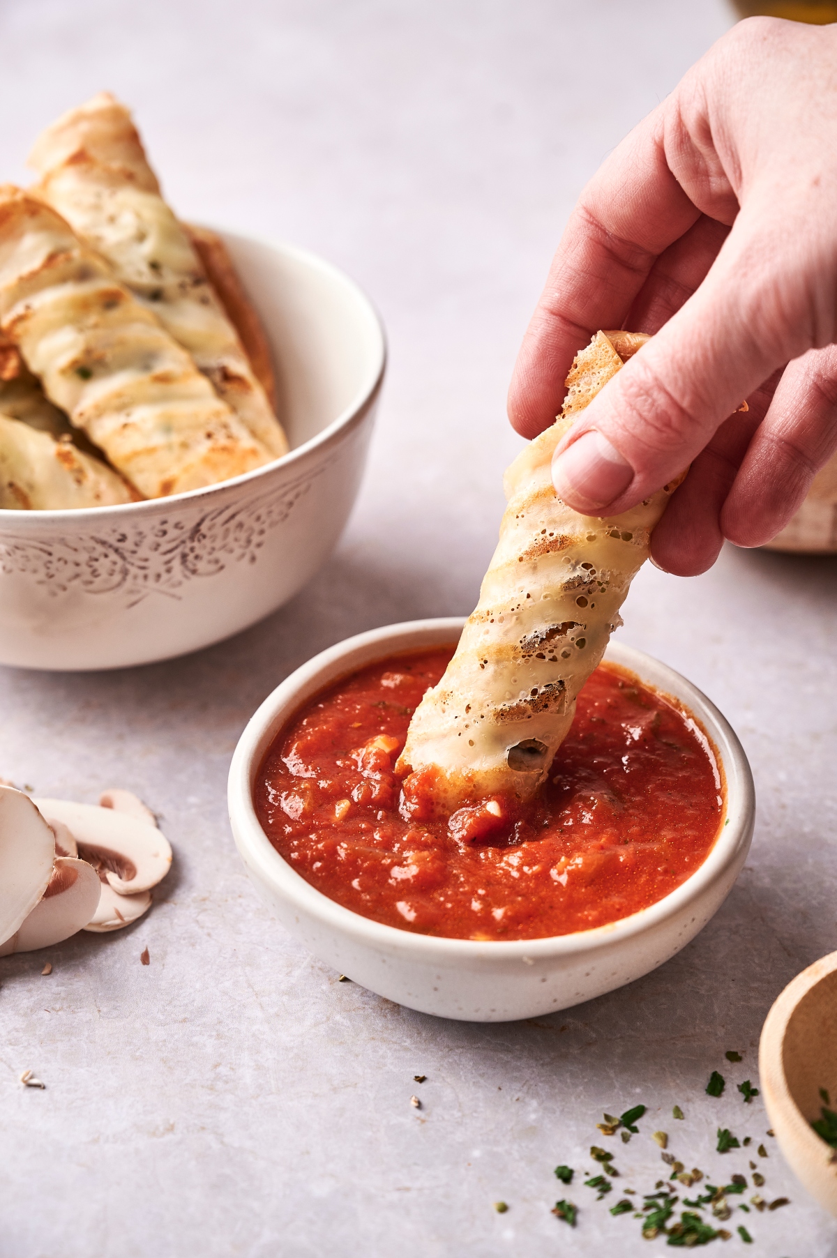 Keto pizza rolls with marinara sauce