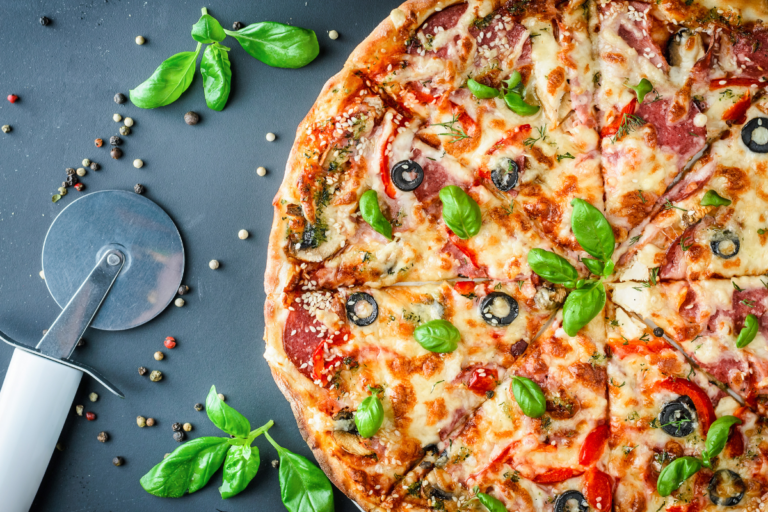 Healthy pizza and a pizza cutter