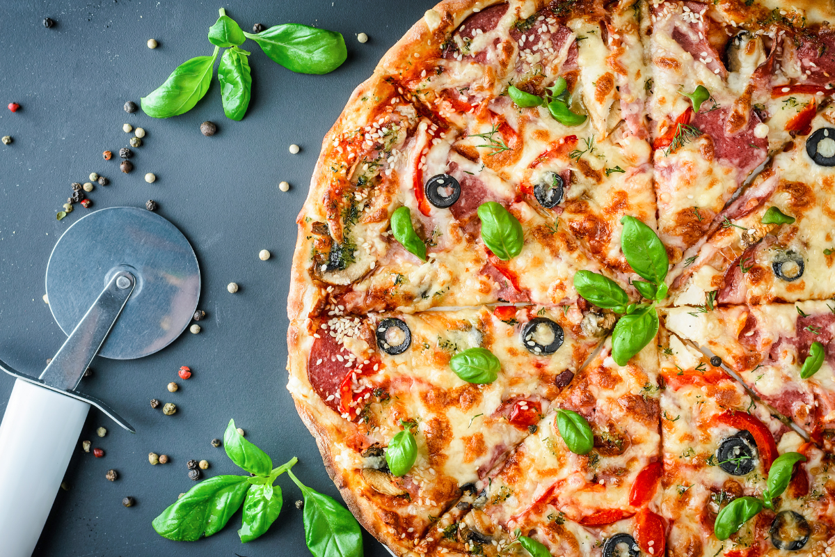 Healthy pizza and a pizza cutter