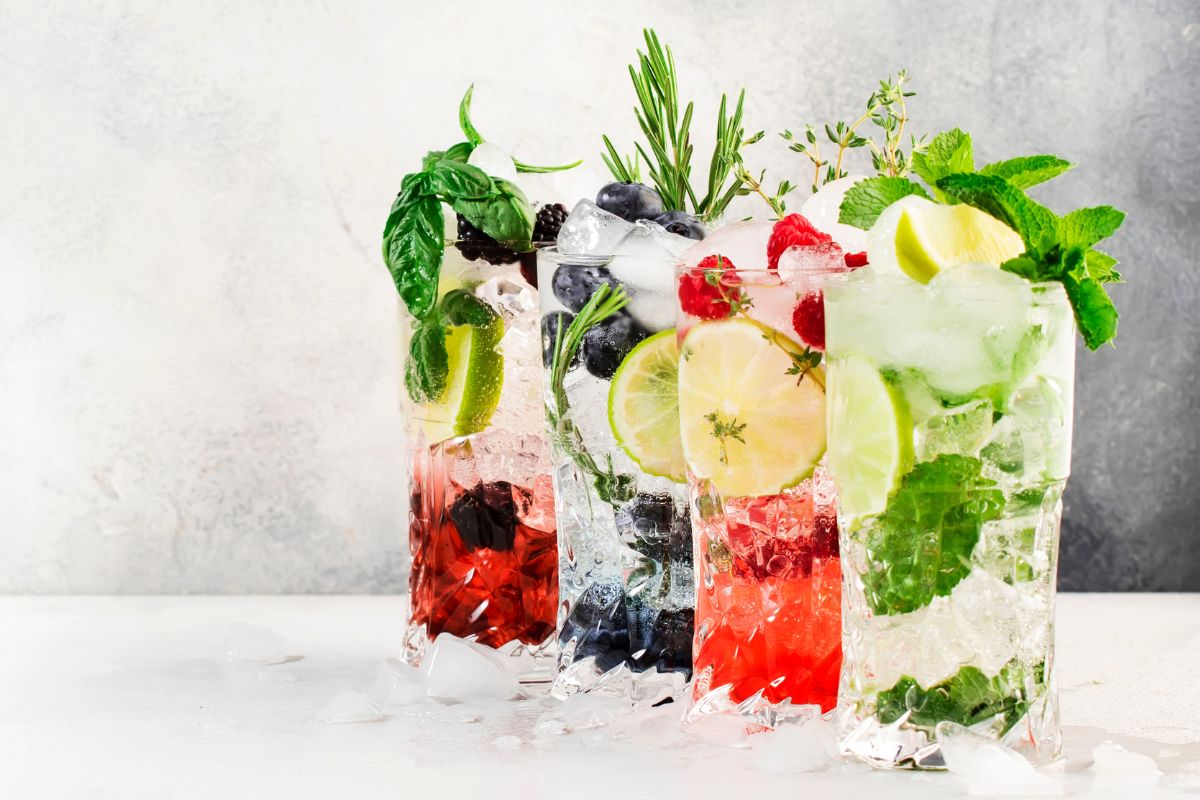 Various low carb moctails on a white table surface