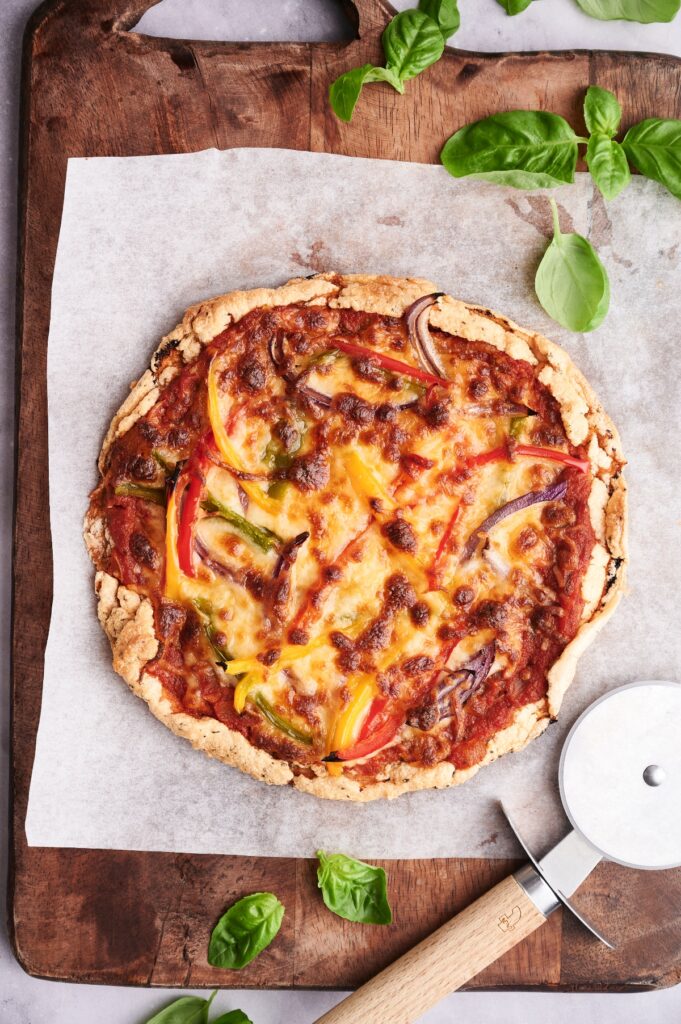 Cloud bread pizza with pizza cutter top view
