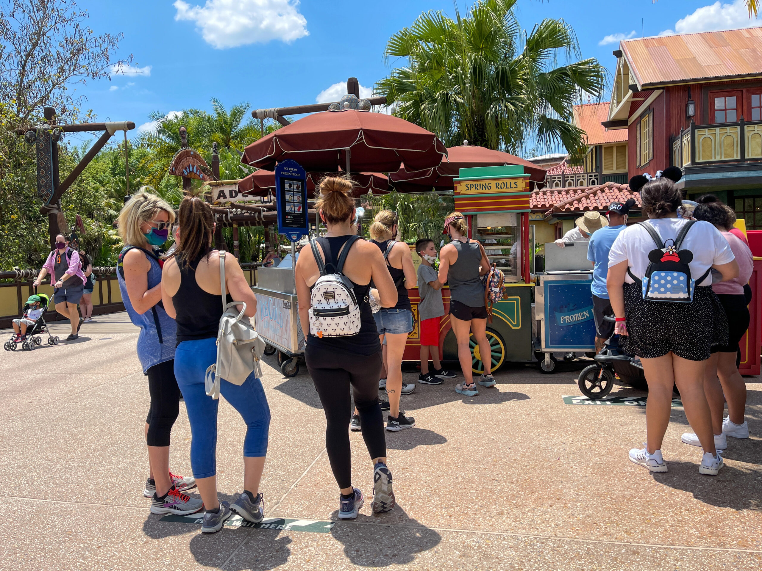 people waiting in line to buy snacks at Magic Kingdom Disney World