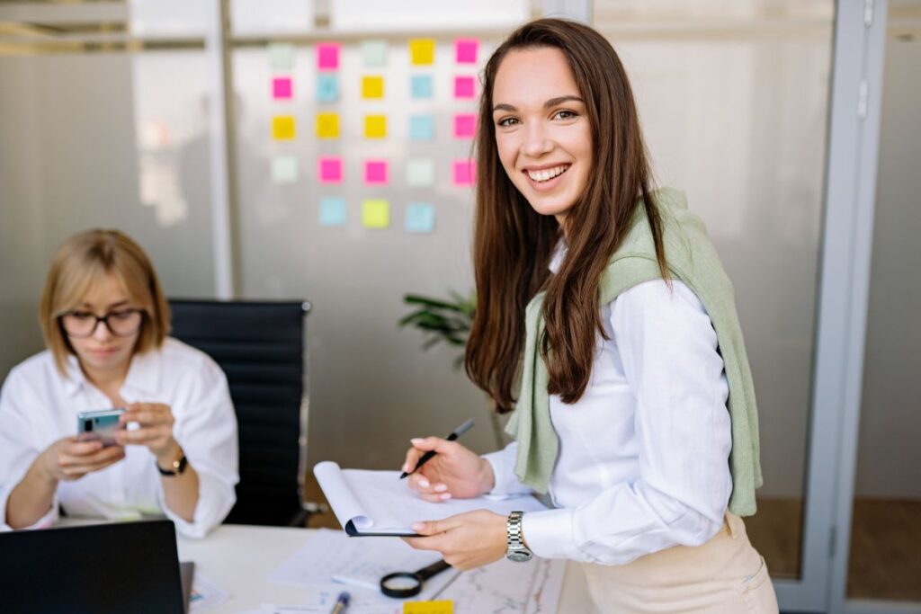 Woman holding clipboard